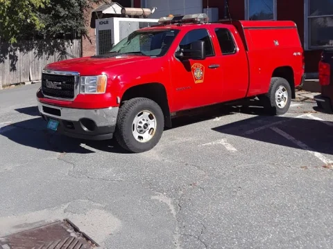 Red fire department rescue pickup truck